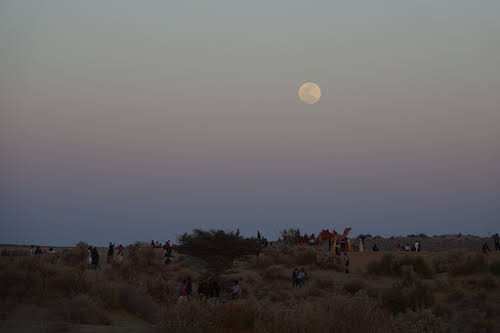 India. Rajasthan Thar Desert Camel Trek. Full moon over the Kadar sand dunes, Thar Desert