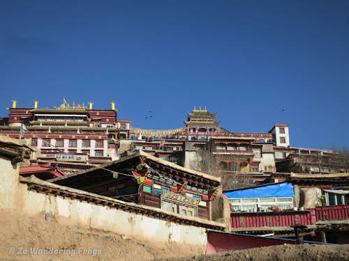 China Sichuan Kham Tibet Garze Ganzi Kandze Monastery Buddhist Festival // Kandze Monastery from the Tibetan quarter