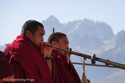 China Sichuan Kham Tibet Garze Ganzi Kandze Monastery Buddhist Festival // Monks Playing Traditional Music Horns