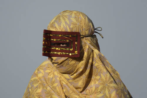 Hormuz Island Guide: Travel Tips & Things To See // Bandari woman wearing the traditional boregheh mask