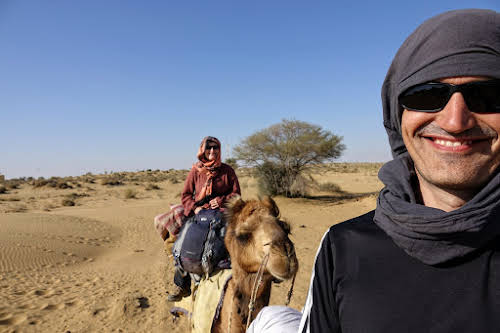 India. Rajasthan Thar Desert Camel Trek. Afternoon ride under the hot sun