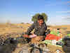 India. Rajasthan Thar Desert Camel Trek. Madan showing us desert cleaning