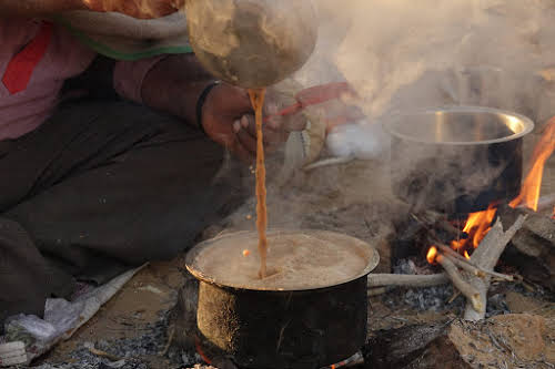 India. Rajasthan Thar Desert Camel Trek. The art of preparing chai
