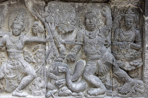 Indonesia. Yogyarkarta Pramantan Temple. Stone carving Snake Belly Face