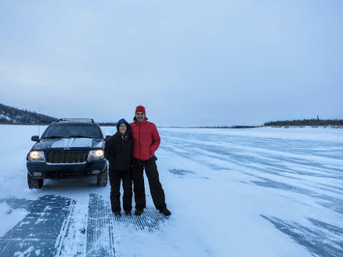 Driving over the Mackenzie River Ice Road