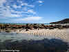 Mini sandy dunes on Stokes Bay rocky lagoon