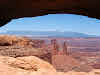 Mesa Arch and view of La Sal Mountain Range, Canyonlands NP
