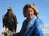 Mongolia. Altai Golden Eagle Festival. Hunter with Eagle