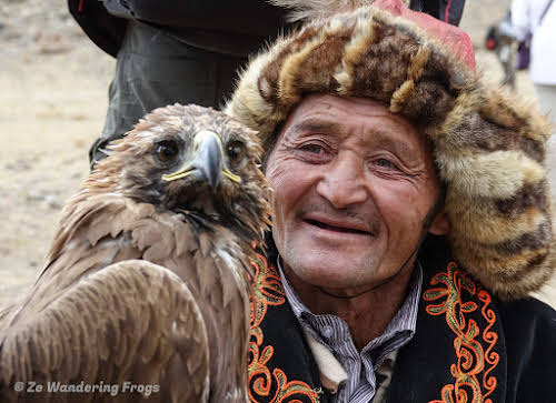 Mongolia. Golden Eagle Festival Olgii. Contest and his eagle during the Golden Eagle Festival