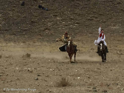 Mongolia. Golden Eagle Festival Olgii. Kyz Kuar - Girls Chasing and Whipping Boys