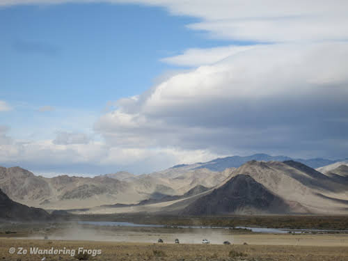 Mongolia. Golden Eagle Festival Olgii. View of the Golden Eagle Festival ground and surrounded Altai mountains