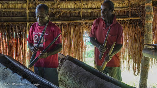 Papua. New Guinea East Sepik River Clans Crocodile Traditions. Drumming in the men's house