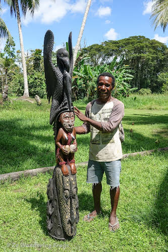 Papua. New Guinea East Sepik River Clans Crocodile Traditions. Statue of the Woman with the Eagle and Crocodile by our guide Vincent