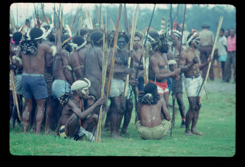 Papua. Tribes Baliem Valley Time Travel. Men gathering