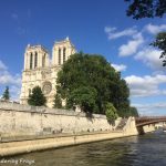 An evening stroll along the banks of the Seine River: the Eiffel Tower and Notre Dame Cathedrale